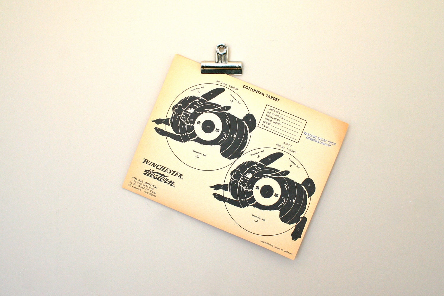 vintage shooting target: yellow double cottontails with sporting goods stamp