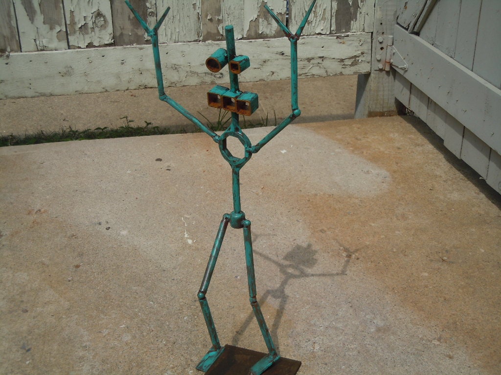 Upcycled abstract steel robot sculpture with distressed paint