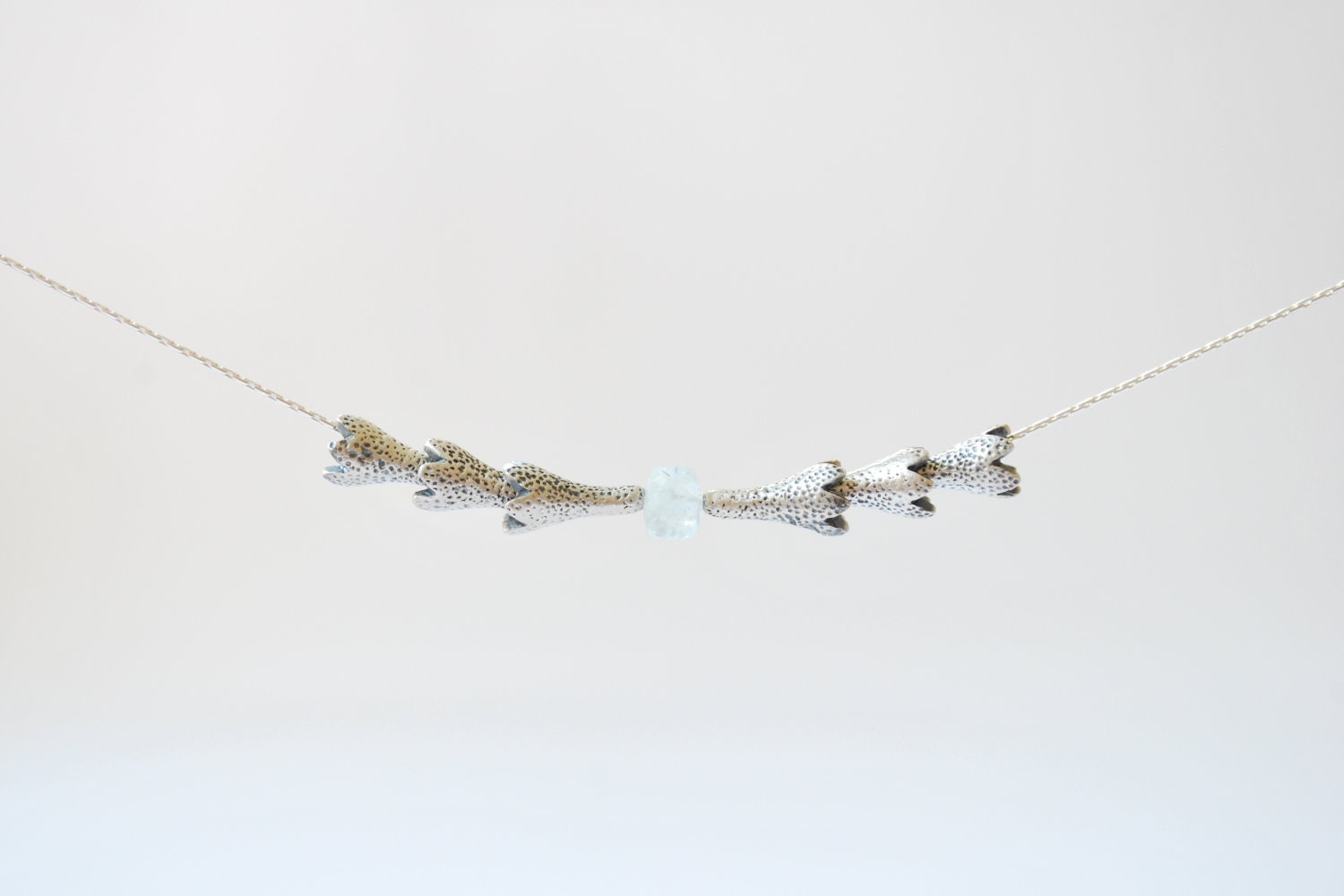 Cloves necklace with aquamarine