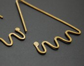 Nazca lines dangle earrings, brass