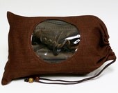 Brown travel bag for shoe storage, vinyl window