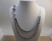 Purple Striped Bead on a Double Strand Purple Freshwater Pearl Necklace