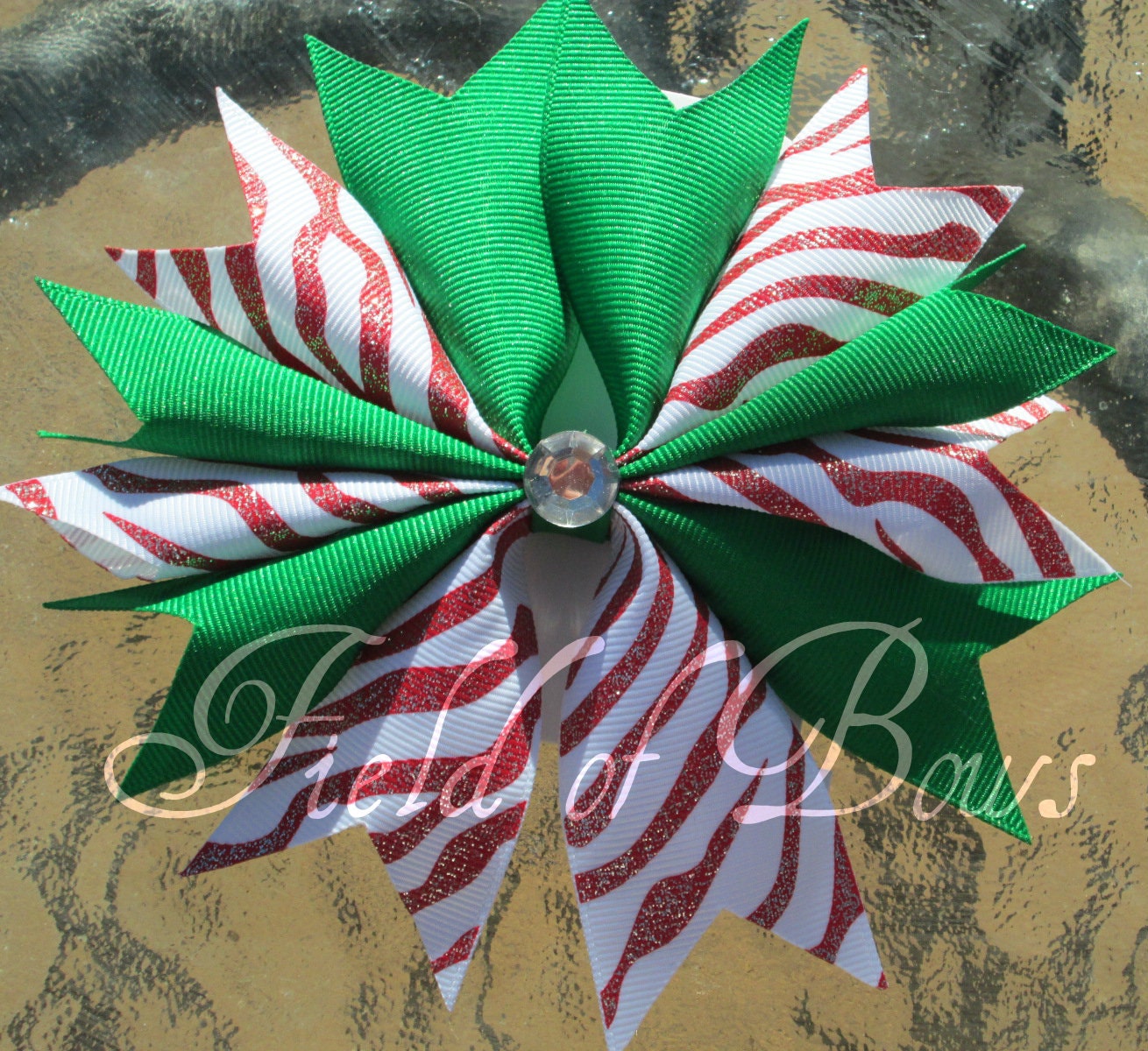 SALE  Green with red and white glittery zebra print spikey hair bow: Christmas. candy cane. red and white stripes