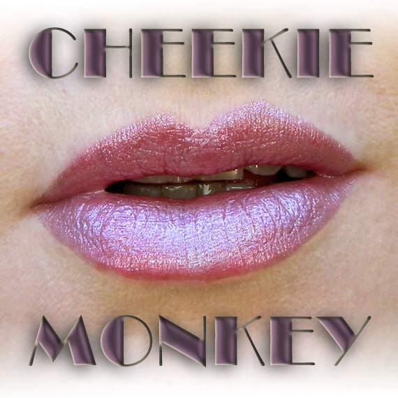 CHEEKIE MONKIE Healing lipstick in a highly reflective, bright light purple with flashes of blue, semi-sheer, 5ml
