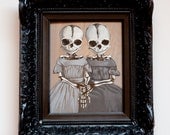 Memento Mori - twin baby skeleton portrait in vintage frame.