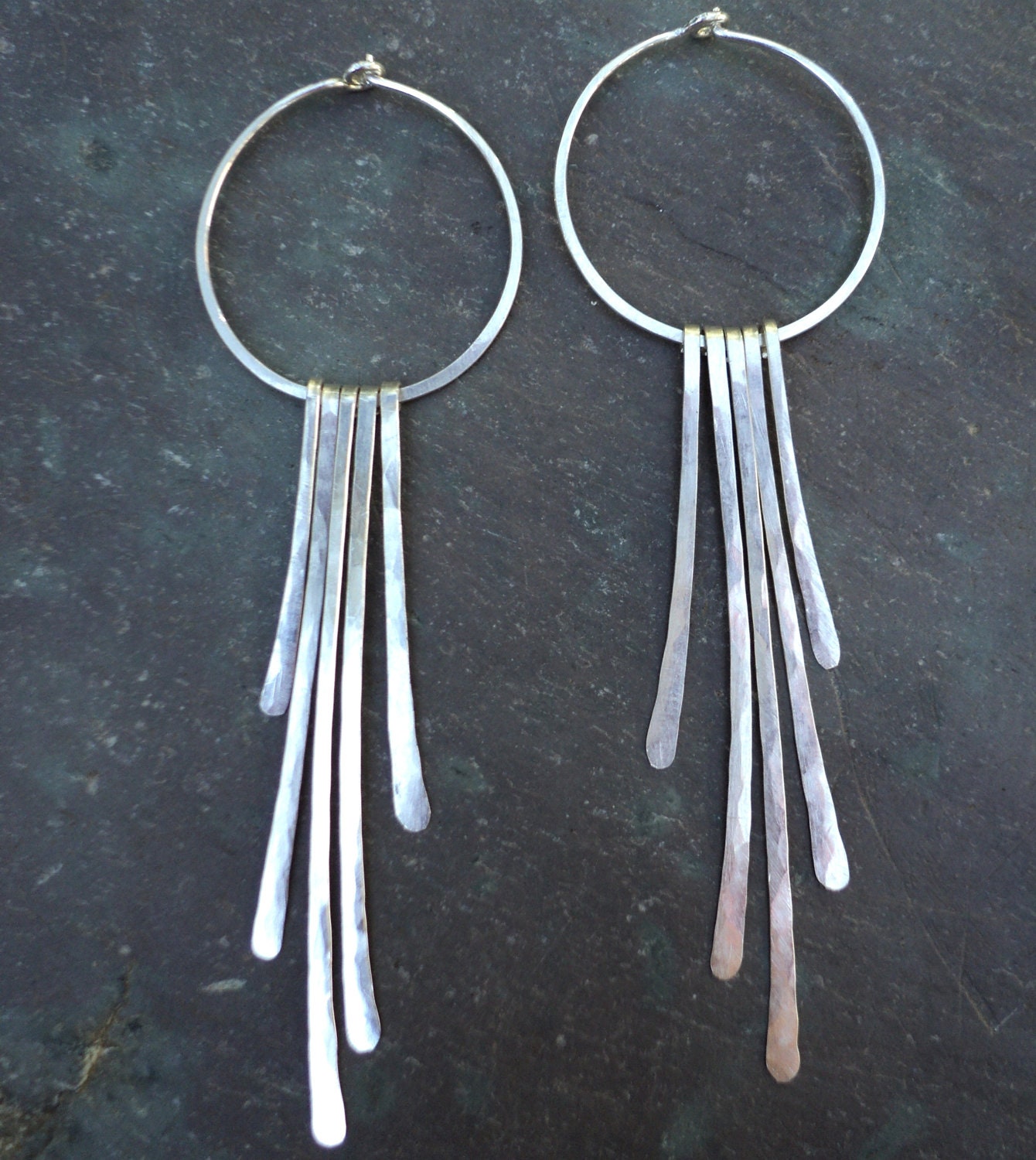 Sterling silver hoop with long hammered "dangles".  Long sexy dramatic adjustable size hammered silver women's earrings.