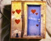 Hearts graffiti and blue door in Tel Aviv repurposed cigar box