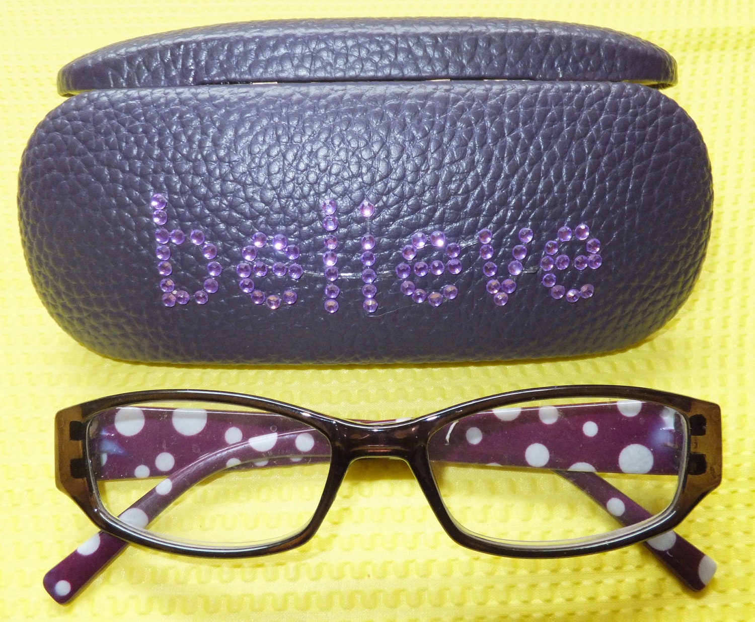 purple eyeglass