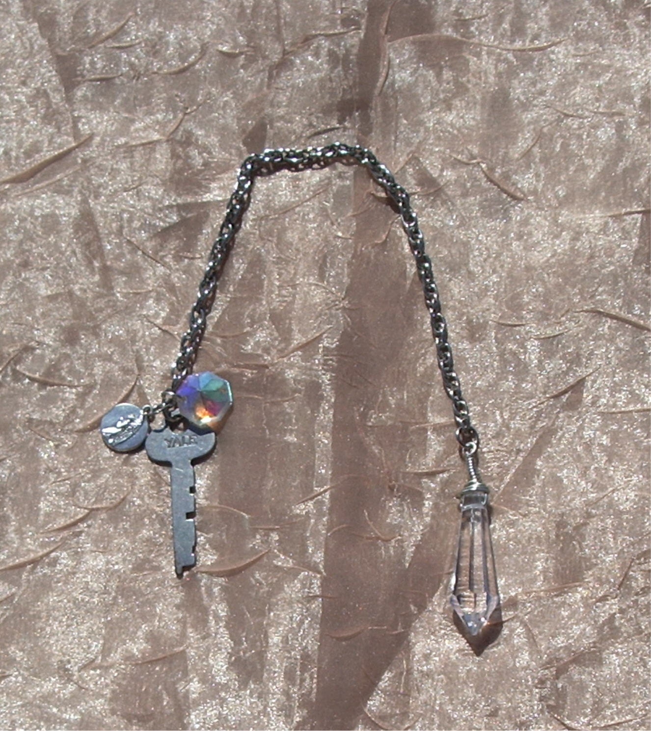 Fortune telling pendulum psychic abilities antique key antique crystal