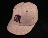 Baseball cap in soft wool flannel fabric, handcut felt old english M,  with 19th century era visor style.