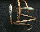 Antique Snake Bracelet . Gilt Egyptian Silver . Turquoise and Garnets .