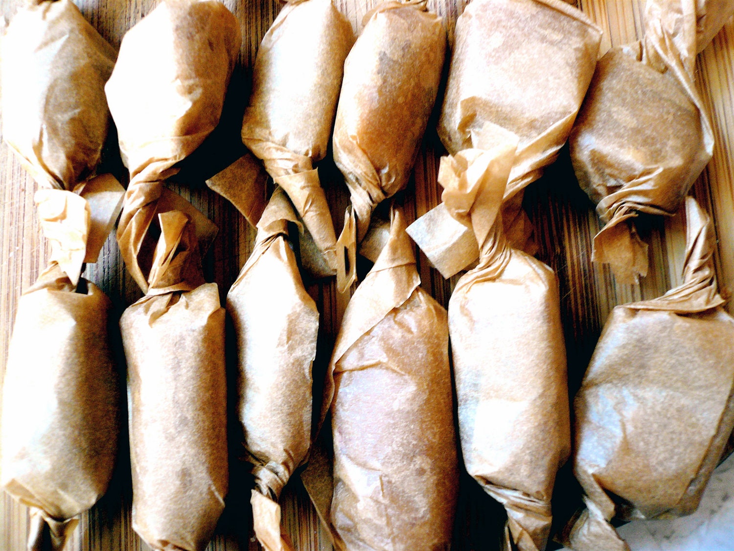 Four 1-dozen bags: 2 Almond vanilla and 2 classic vanilla organic handmade fleur de sel caramels