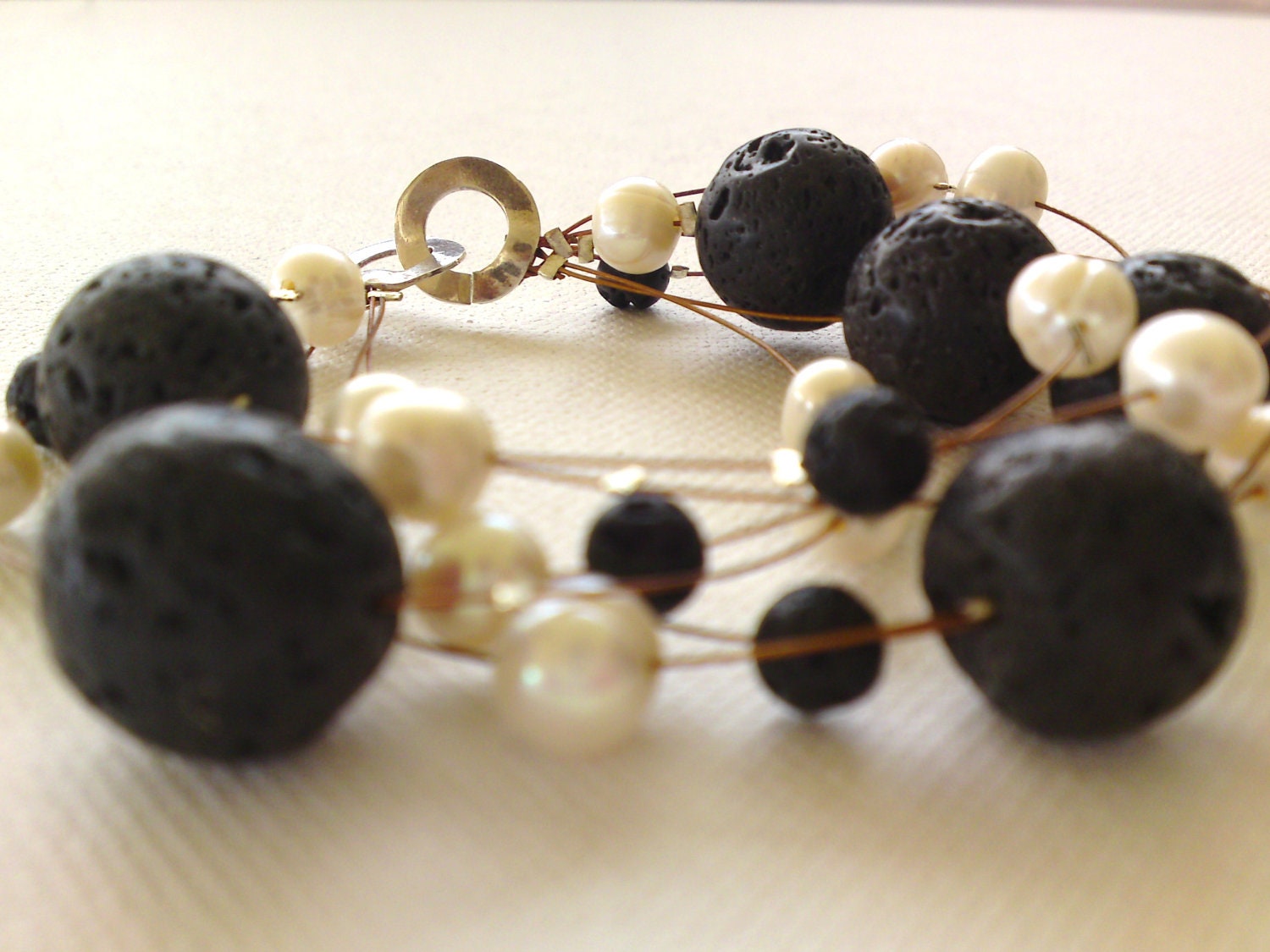 Wedding bracelet with black Lava beads and freshwater pearls-unique sterling silver clasp