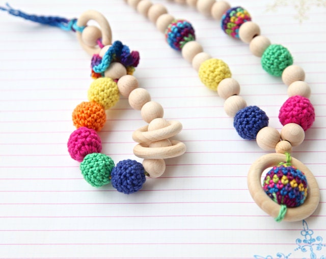 Bright set of 2. Teething ring toy and nursing necklace. Multicolor rattle for baby and mom.