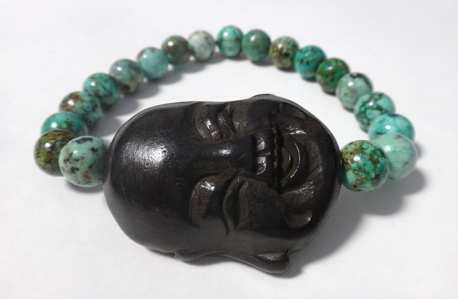African Turquoise Beaded Bracelet with Brown Carved Buddha