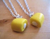 Split Twinkie best friends necklaces made from polymer clay