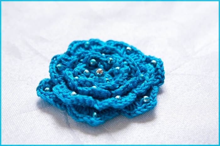 Crochet flower, blue beaded crochet rose brooch
