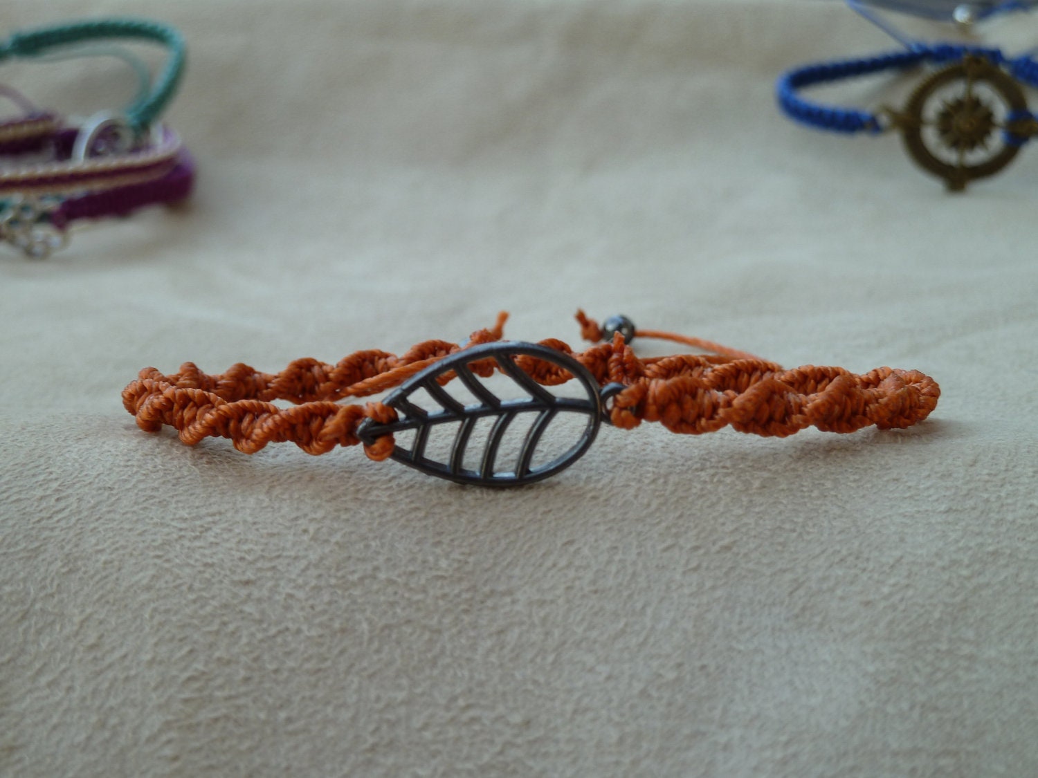Rusty Orange Macrame Bracelet with Gunmetal Finish Leaf Charm & Sliding Adjustable Closure
