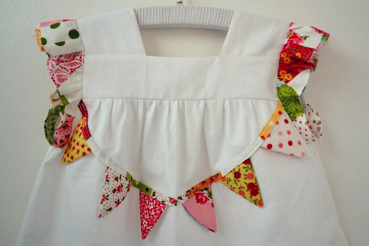 White and patchwork floral bunt girls dress