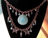 Double strand Copper Necklace with large Aventurine pendant.  Swarovski Crystals wire wrapped. Copper Butterflies charms and ornate beads.