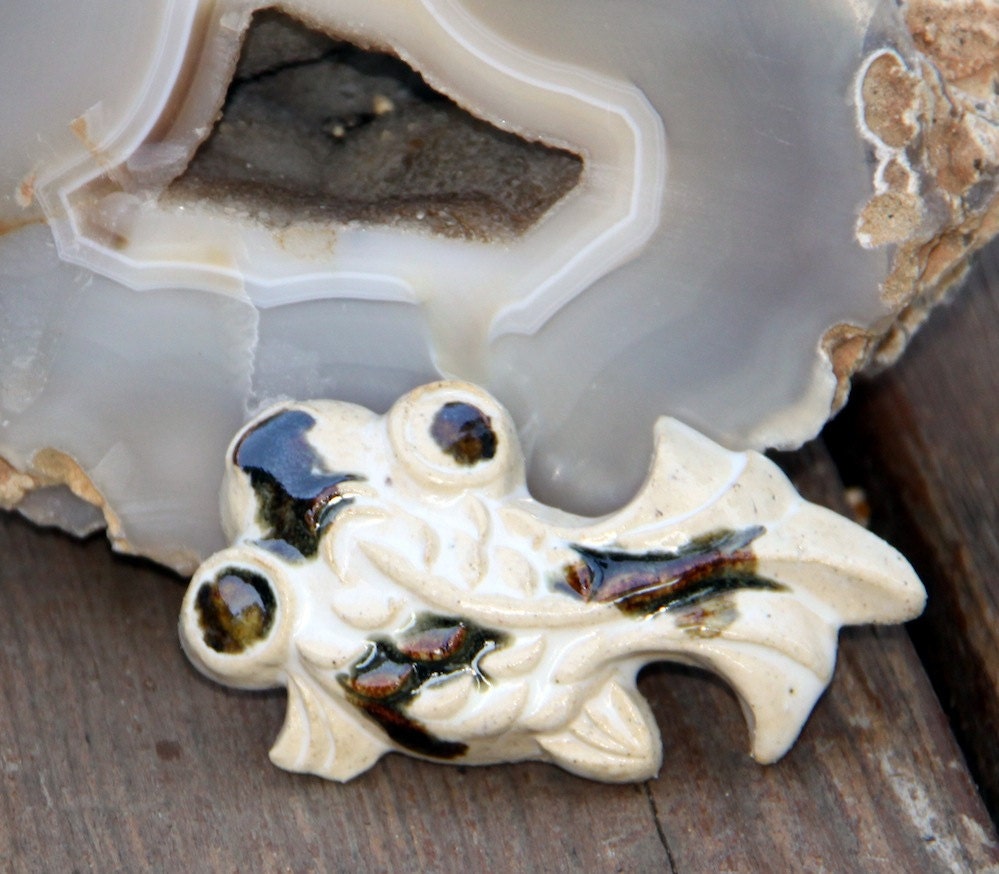 Small Ceramic Goldfish wall art, fountain decor, or shelf sitter.