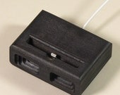 Acoustic dock  for iPhone 5 in Black  - Amplifies sound through unique acoustical pockets .