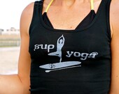 SUP Yoga done in vintage looking silk screen on a black workout tank top with a plain back