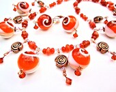 Exotic beaded goddess statement necklace set - sunset orange conk shell necklace - orange and white copper necklace by Sparkle City Jewelry