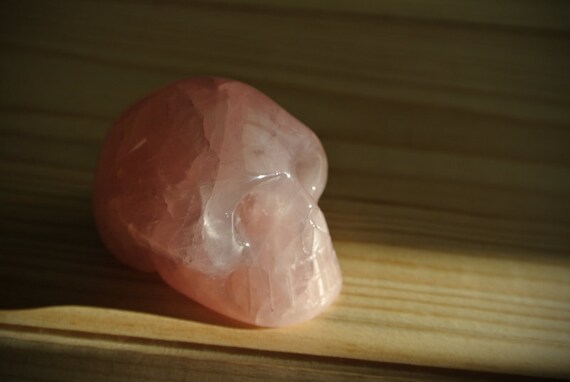 pink skull carved from rose quartz featured image