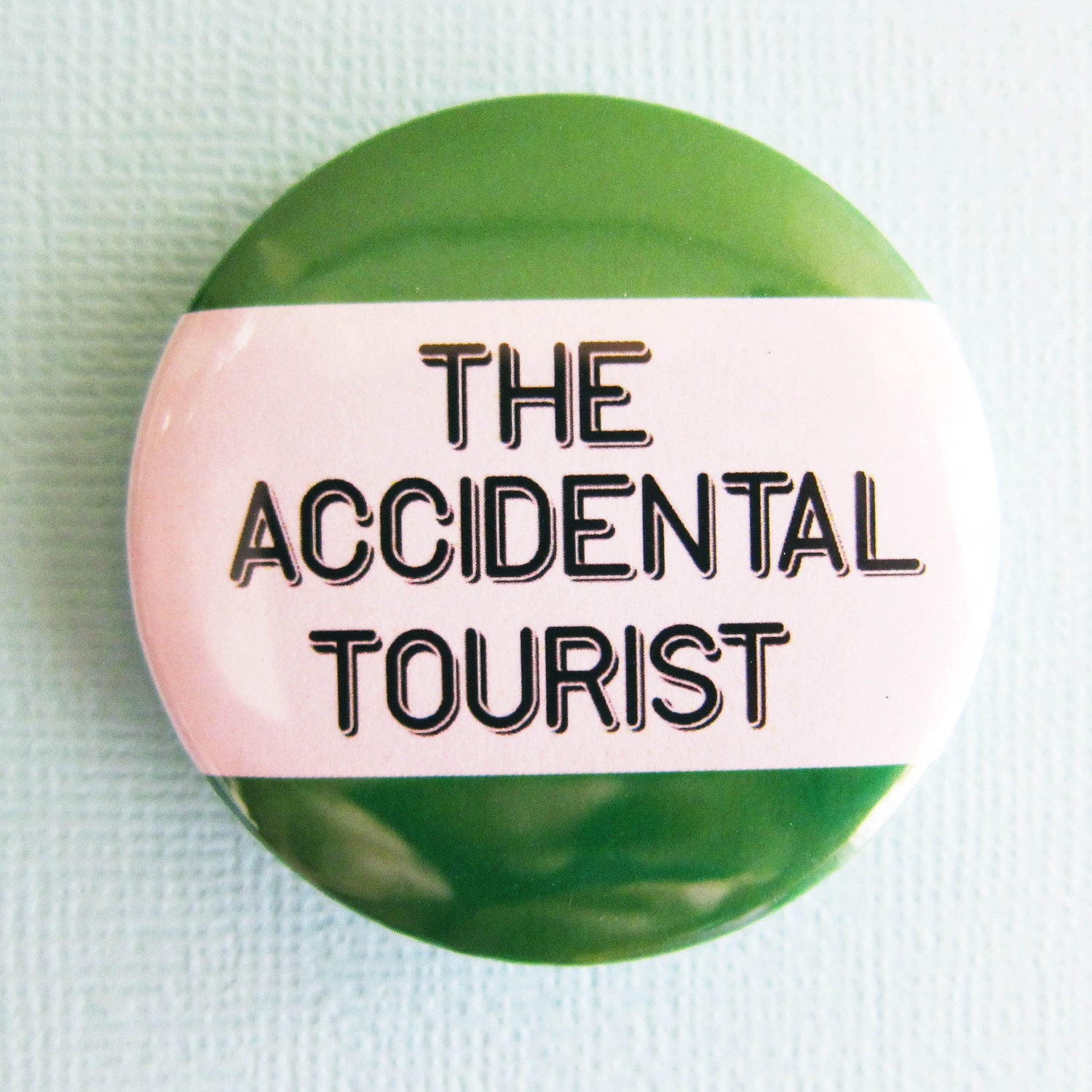 The Accidental Tourist - 1.75" Badge / Button