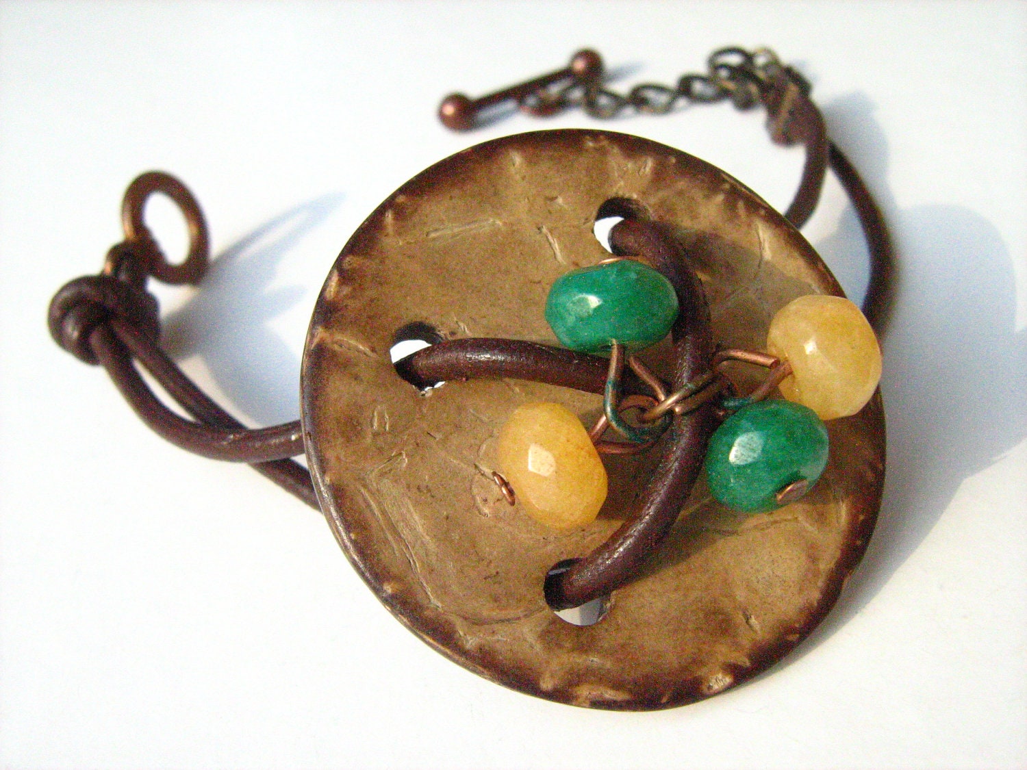 Button bracelet. Dark Brown leather cord