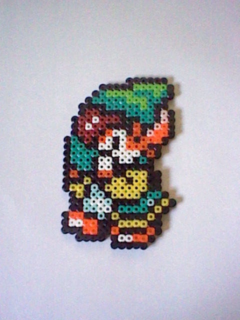 The Legend of Zelda Flute Boy perler bead creation....melted beads with magnet on back