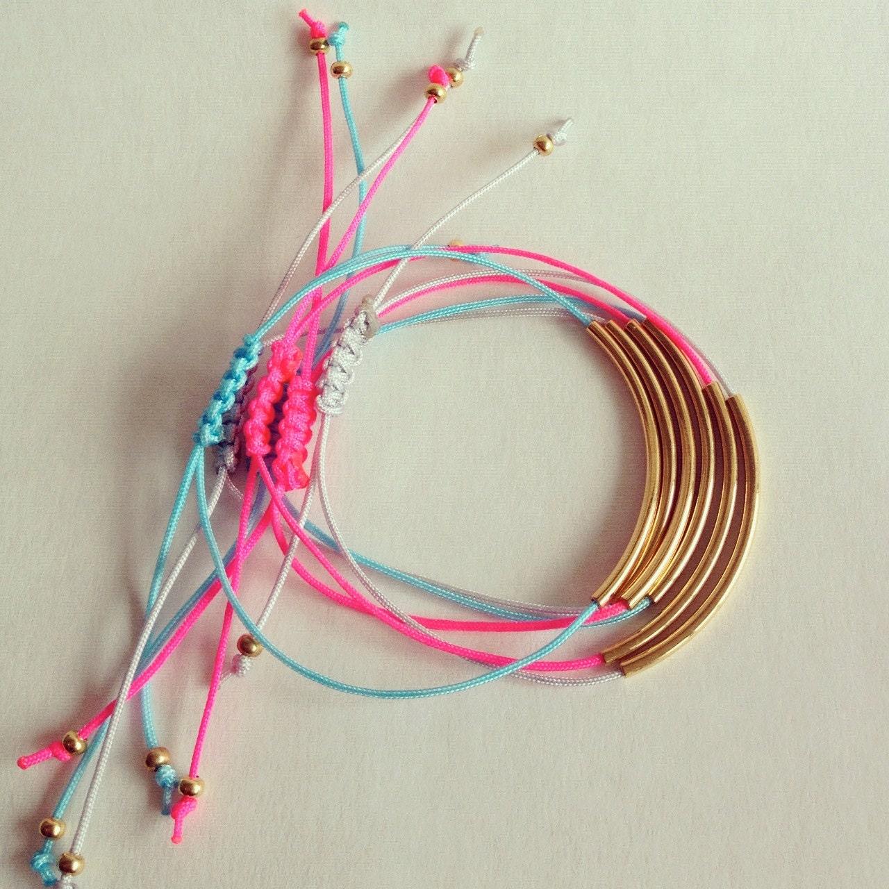 Aqua Cord Bracelet with Gold Plated Tube Bead (Huggers)
