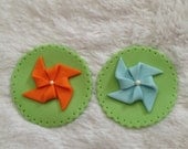 Adorable Edible Fondant Pinwheels cupcake or cookie toppers, perfect for birthdays or showers.