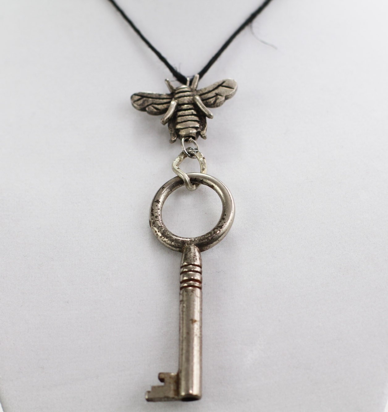 Subliminal Message a Findings based necklace with bee and skeleton key jewelry