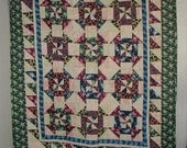 Pinwheel, Triangles and Squares Quilt