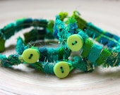 1-stitch green recycled fabric bands with lime buttons