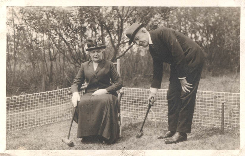 Vintage Photo 1918 Grandma plays Croquet w Gramps from a Chair