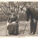 Vintage Photo 1918 Grandma plays Croquet w Gramps from a Chair