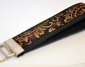 Earth Toned Black, Rust, Olive and Tan Paisley Fabric Wristlet Keychain