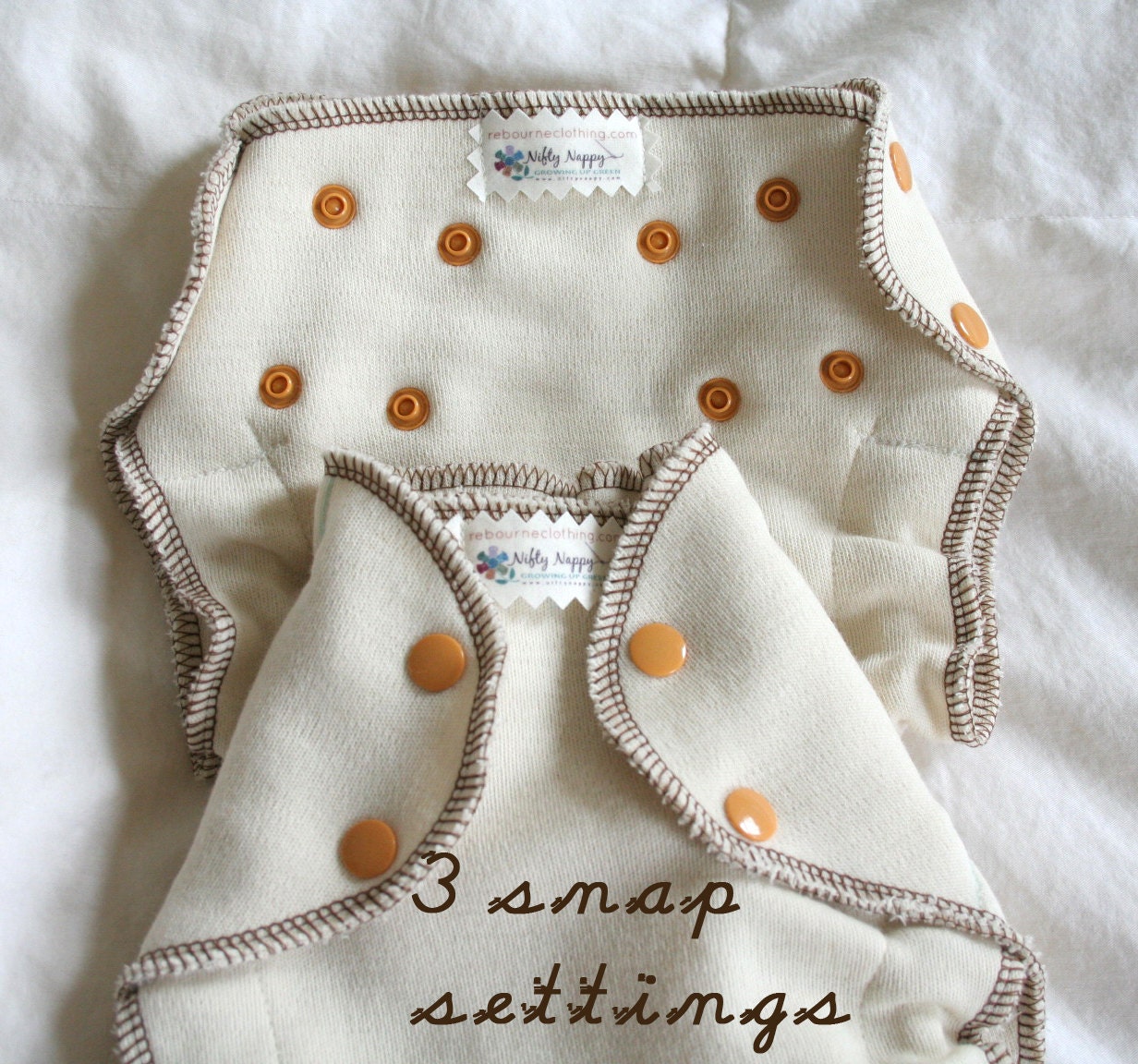 newborn wool covers - 2 - chai latte brown and orange - side snapping - birth to 15 pounds - certified organic wool