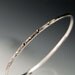 Textured Sterling Silver Bracelet Ceylon Sapphires in 18k gold Setting and Gold Accents Thin Oxidized Bangle