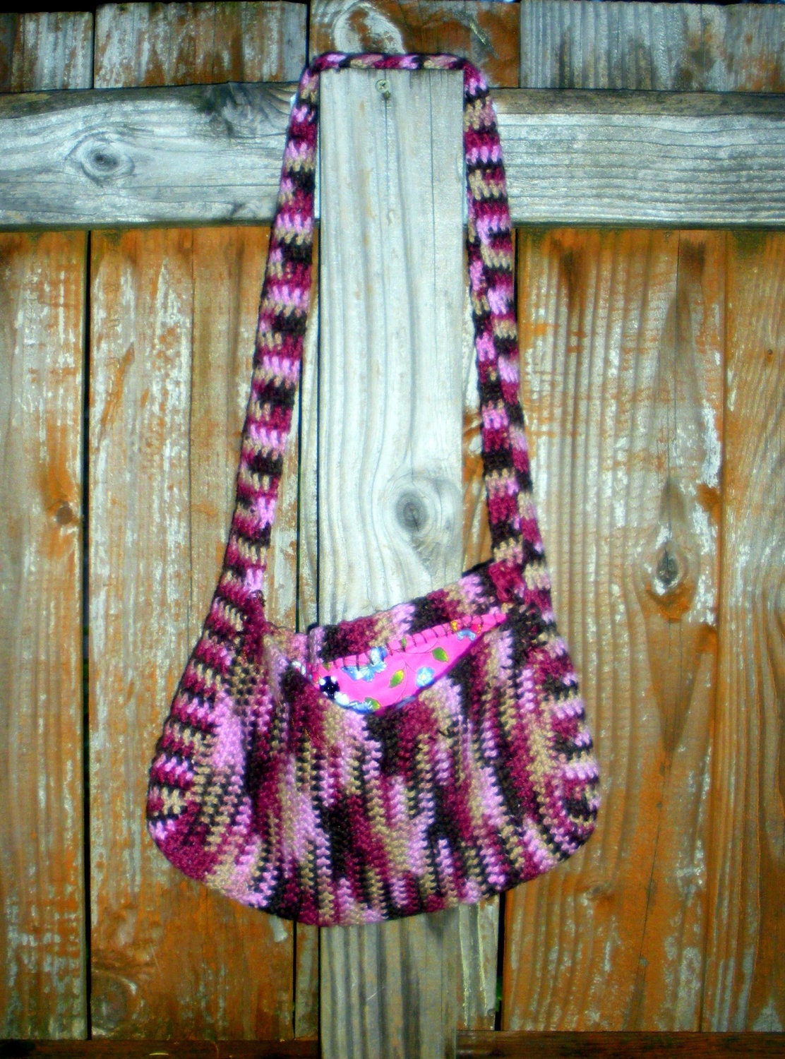 Pink and Brown Crochet purse with flannel floral print lining, ready to ship.