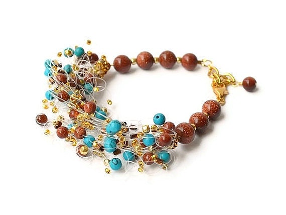 Airy crochet bracelet with turquoise and goldstone blue and brown country style