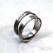 Simple loop ring with longitude and latitude engraved, sterling silver, satined finish