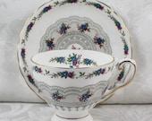 Tuscan Pink and Blue Floral Lace Honiton Pattern English Teacup and Saucer
