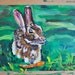 Rabbit eating a carrot painting in green grass brown hare long ears oil painting on 9x12 painting paper