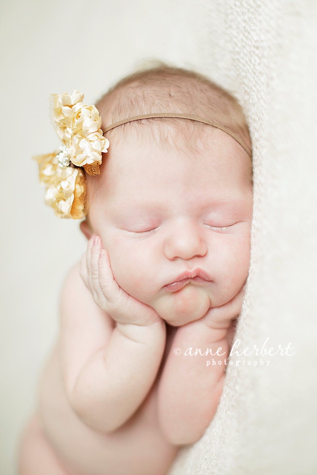 Newborn Baby Girl Headband: Golden Satin Rosettes Petite Dainty Bow on Skinny Brown Headband. Other sizes also available.
