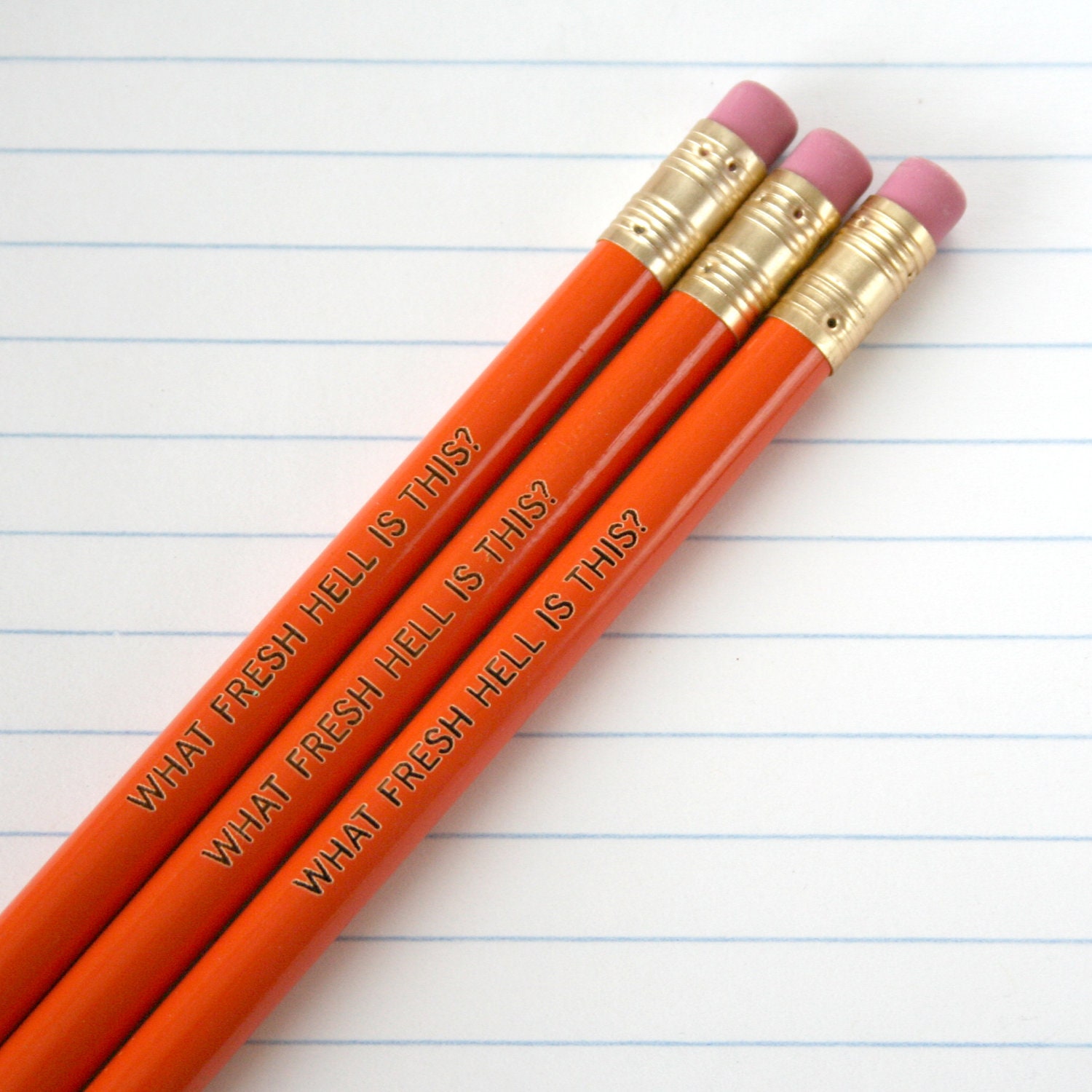 what fresh hell is this engraved pencil set 3 orange pencils. not another irritation, ugh.