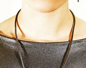 Black Chainmaille Segment on Suede